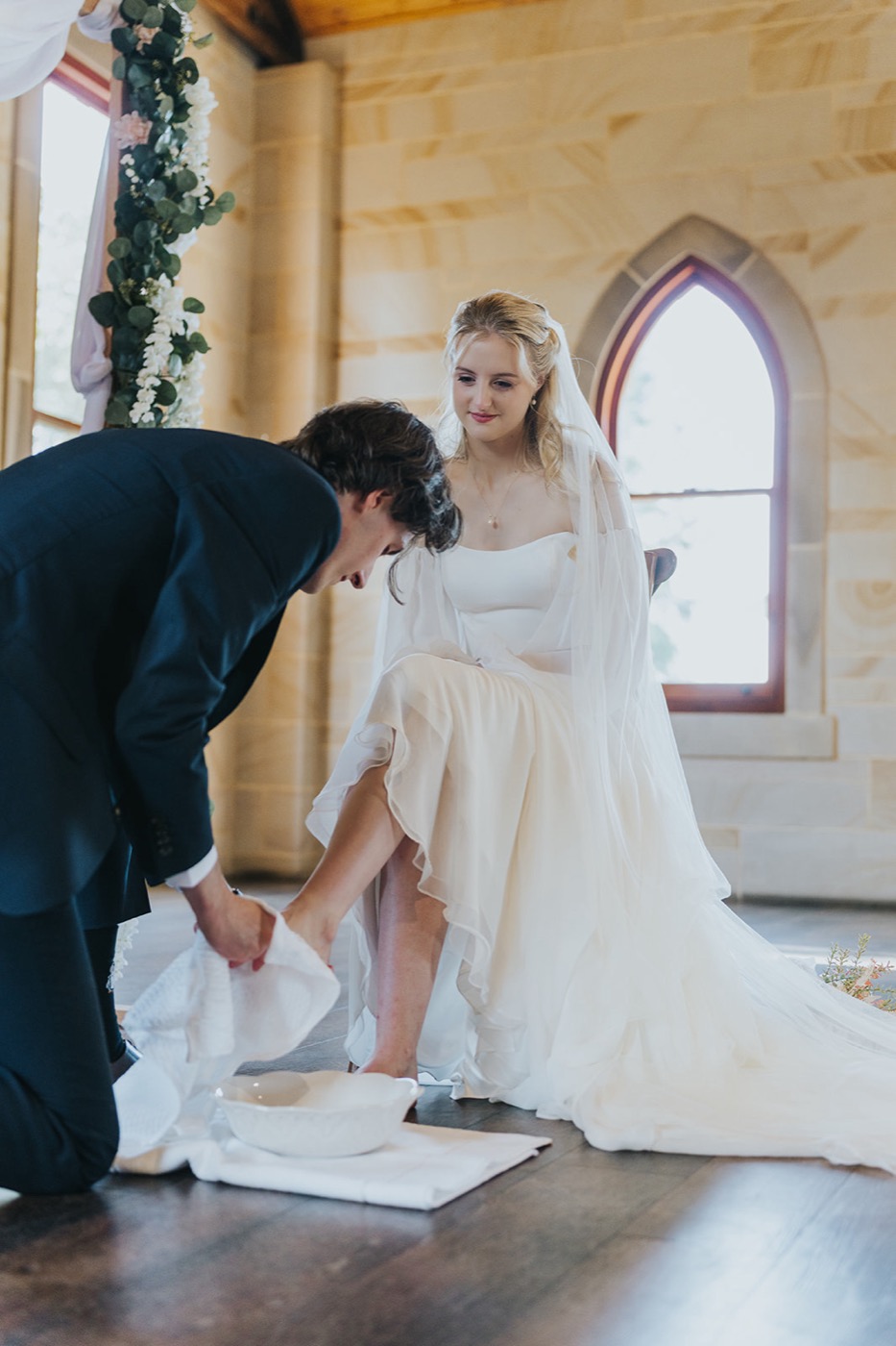 Josh washing Miriam's feet in the chapel