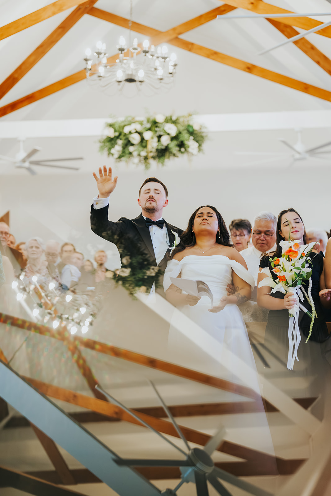 The newlyweds celebrating at the altar, seen from above