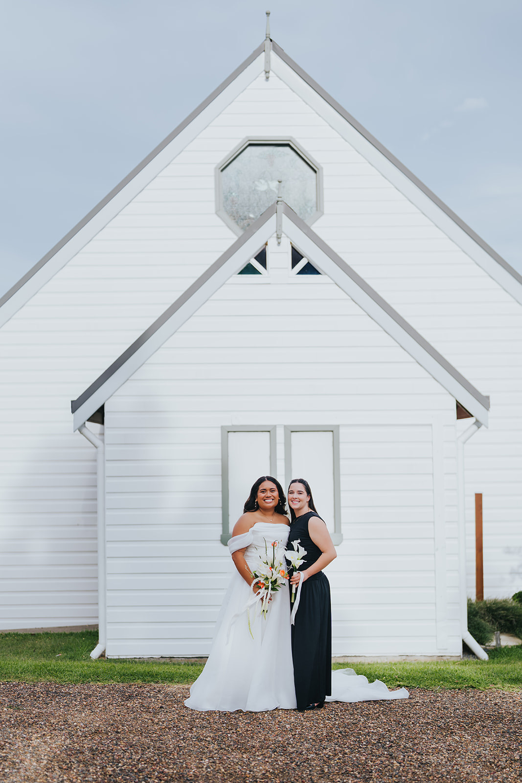 Sophia and Lachlan in front of the chapel doors