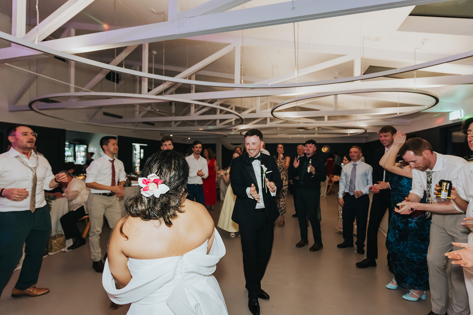 Guests forming a circle around the couple on the dance floor