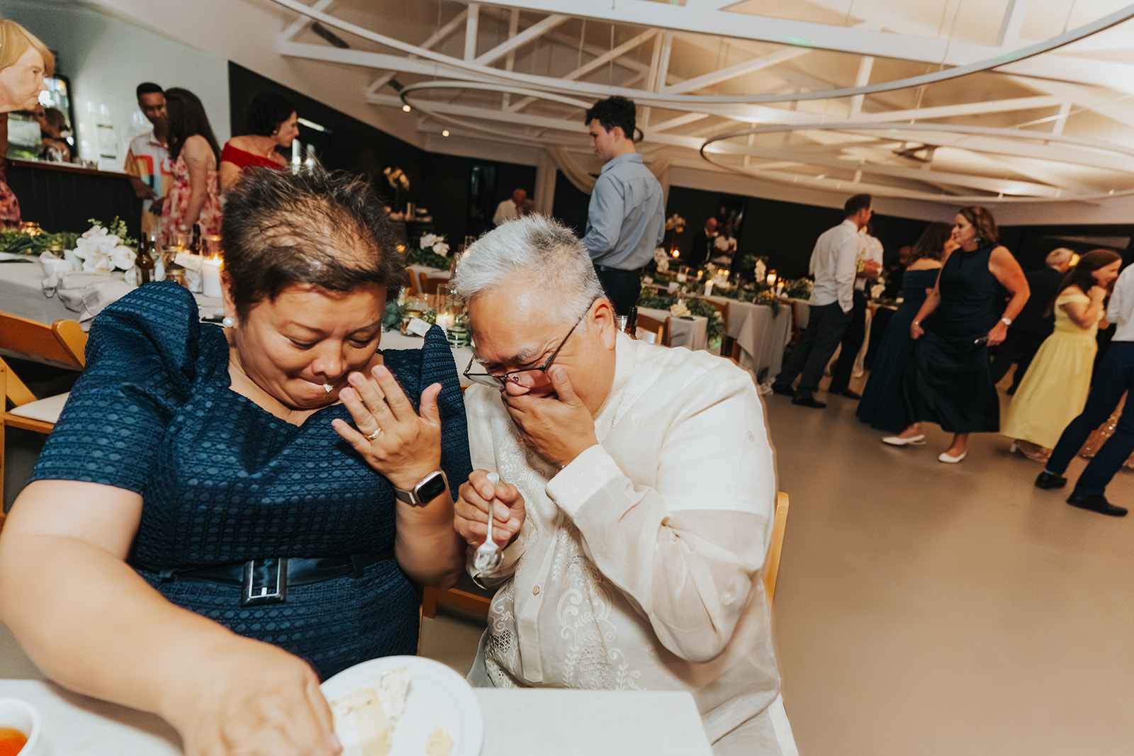 Family members laughing together on the dance floor