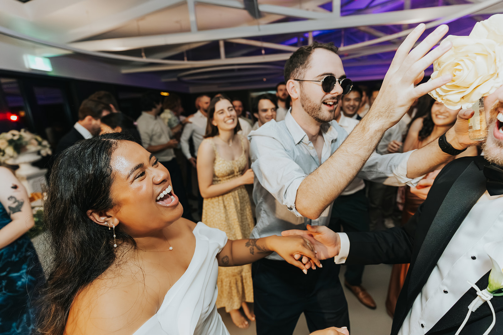 Friends singing along on the dance floor