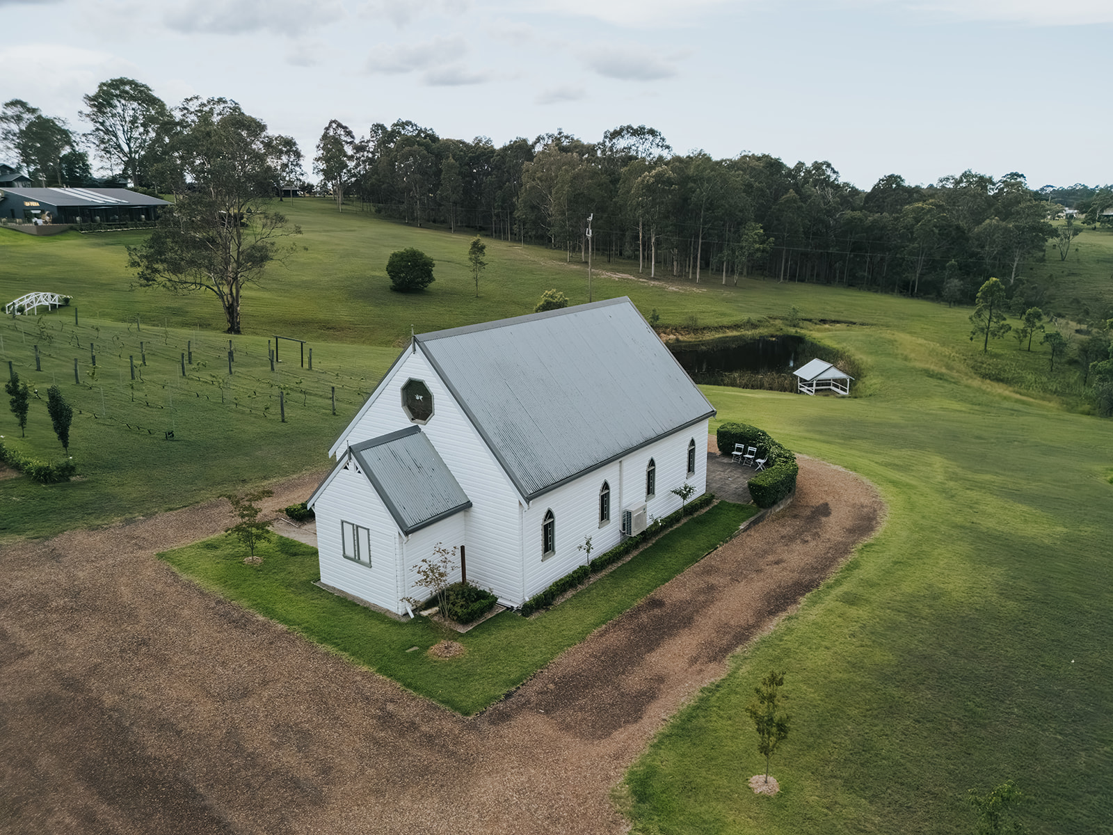 Drone view of the chapel and grounds of La Pera Estate
