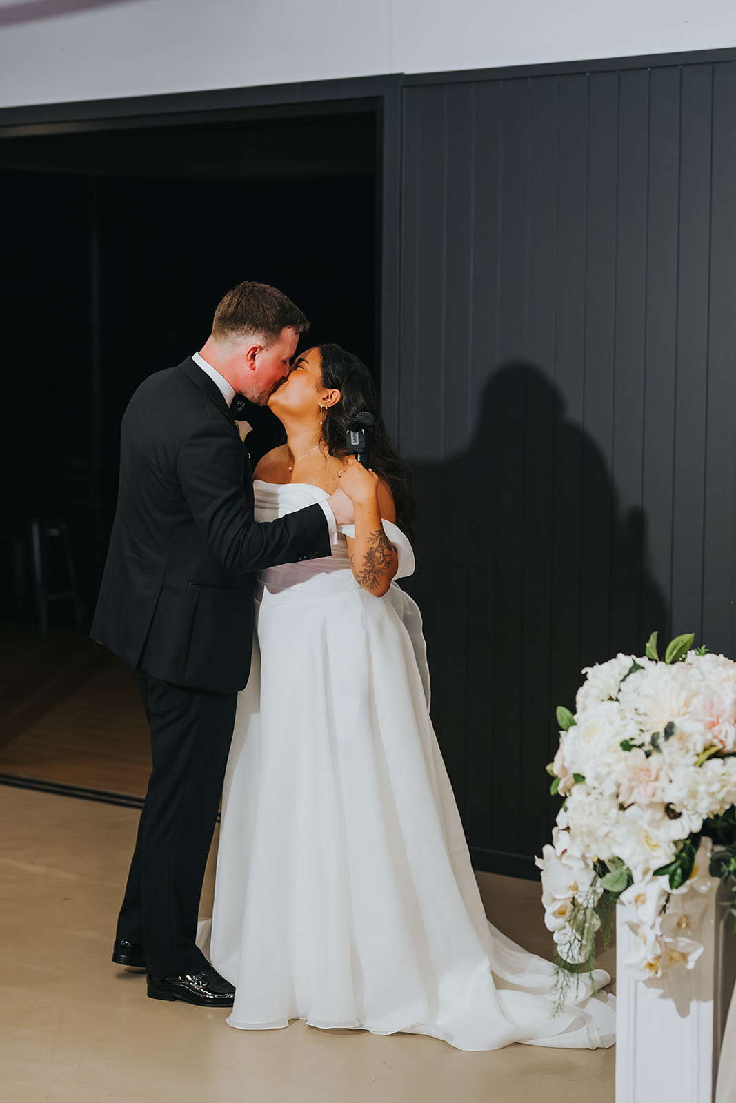 Lachlan kissing Sophia during their first dance