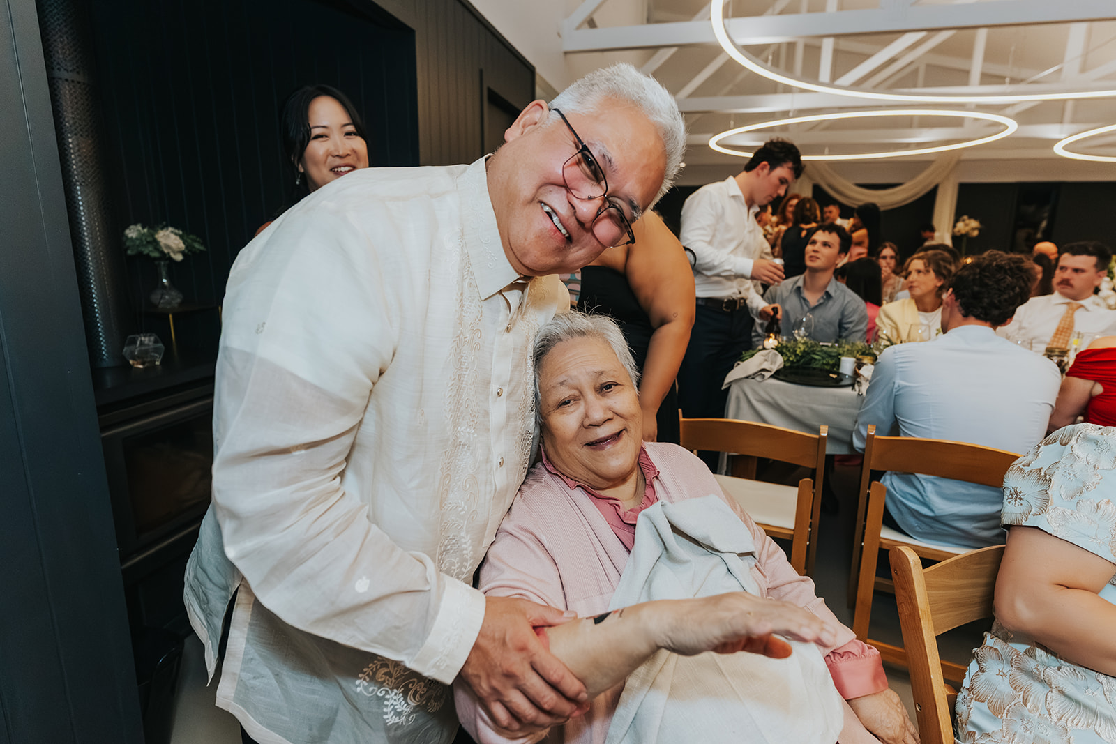 Family members in fits of laughter at the reception