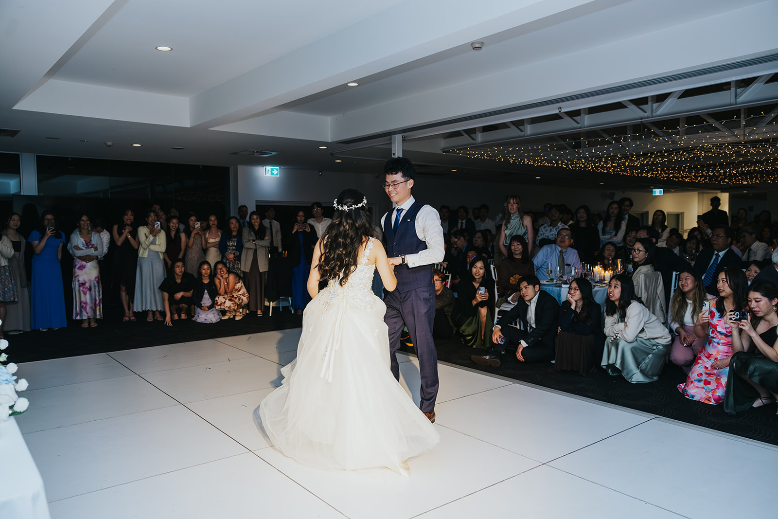 The first dance with guests circling the dance floor