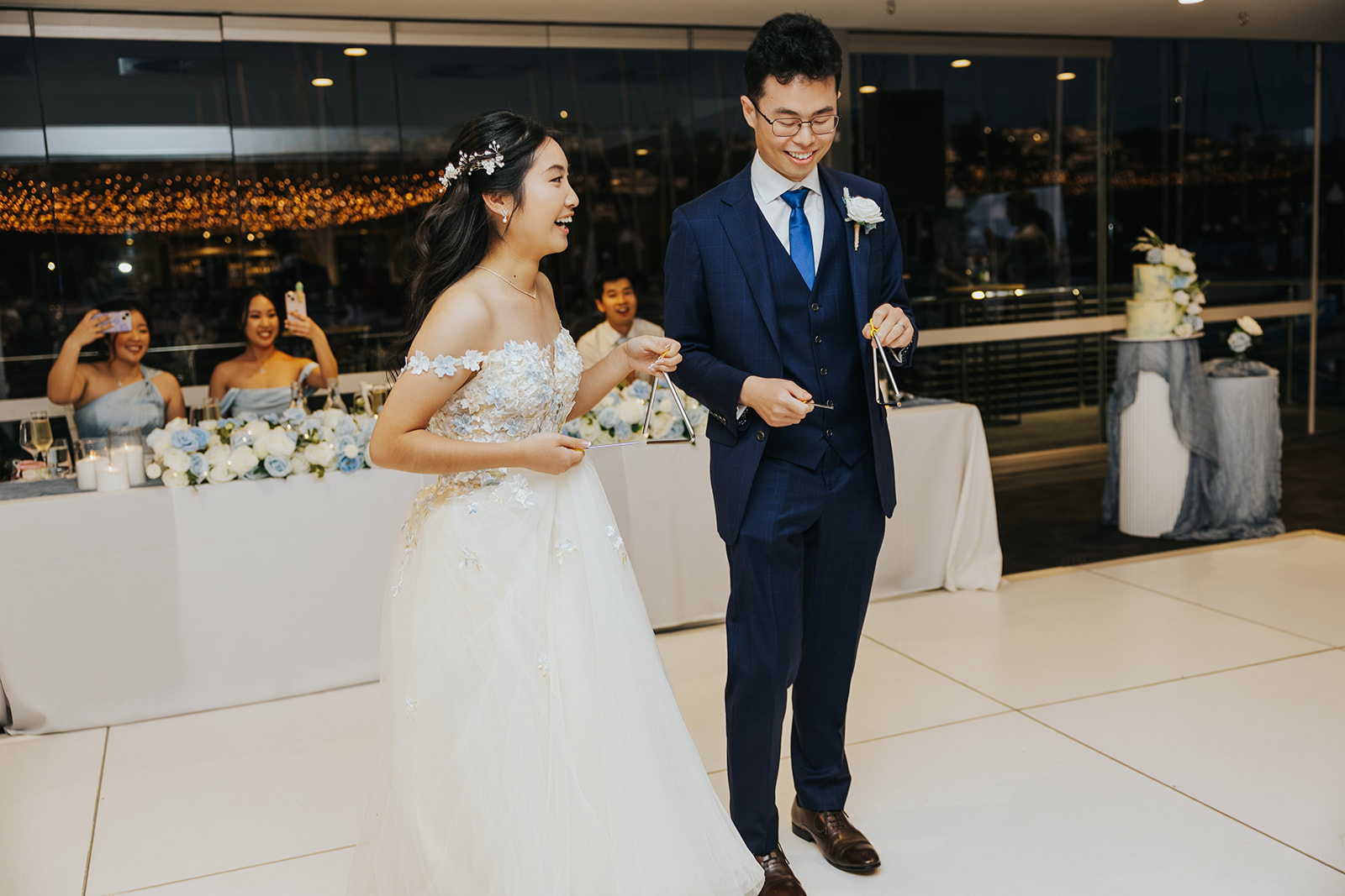 Rabi and Shaphir walking into the Orso Bayside reception