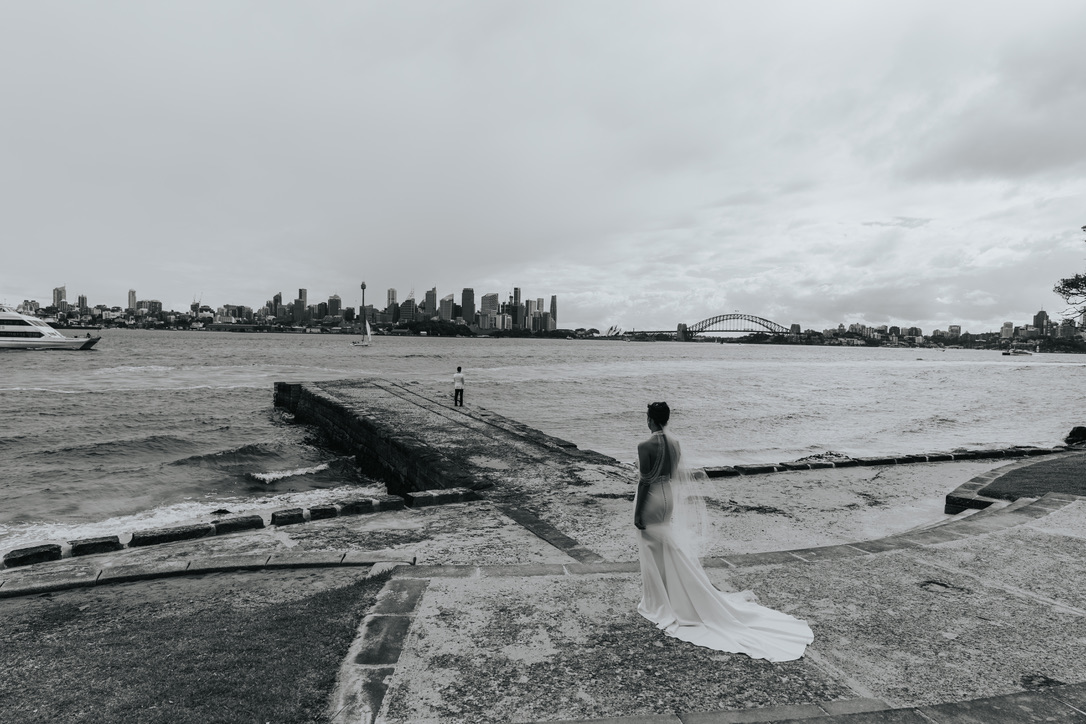 Black and white first look on the harbour foreshore with the city skyline